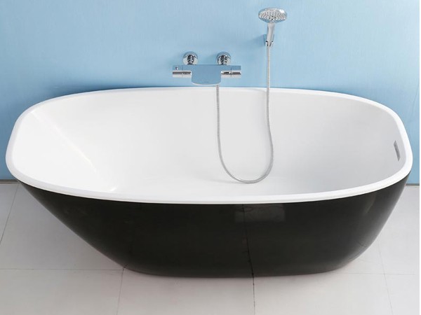 Black deep freestanding bath with wall hung faucet