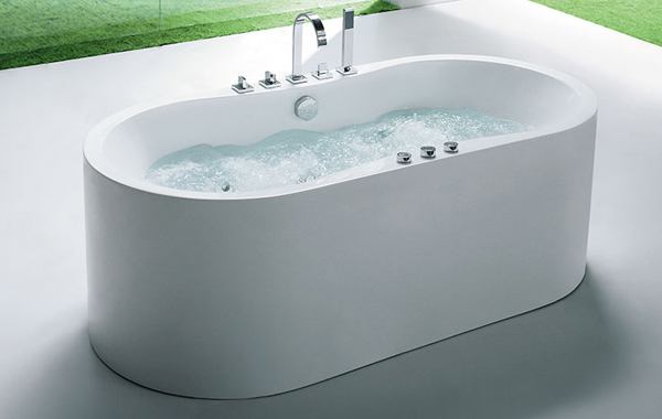 freestanding whirlpool tub offers an ample deck space for versatile faucet installation