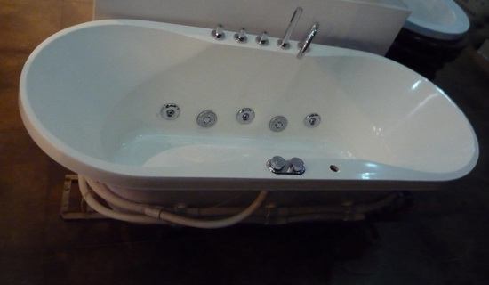 Oval soaker soft tub with massage jets