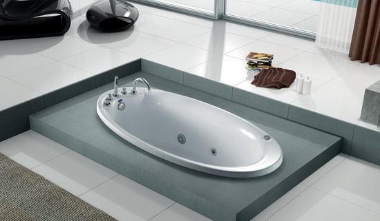 Oval soaking soft bathtub in bathroom
